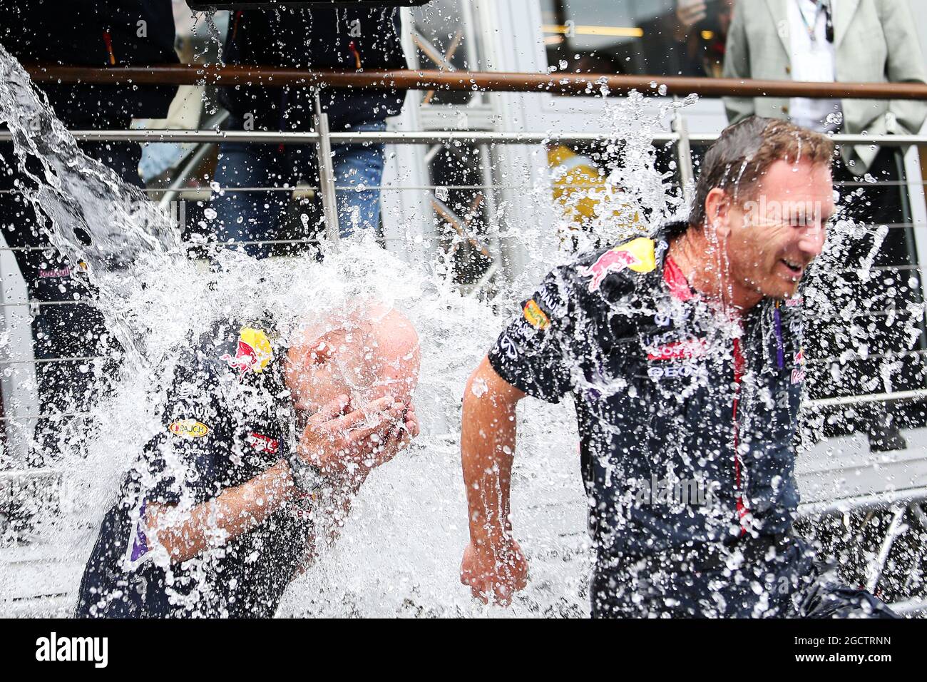 (L to R): Adrian Newey (GBR) Red Bull Racing Chief Technical Officer and Christian Horner (GBR) Red Bull Racing Team Principal take part in the ALS ice bucket challenge. Belgian Grand Prix, Saturday 23rd August 2014. Spa-Francorchamps, Belgium. Stock Photo