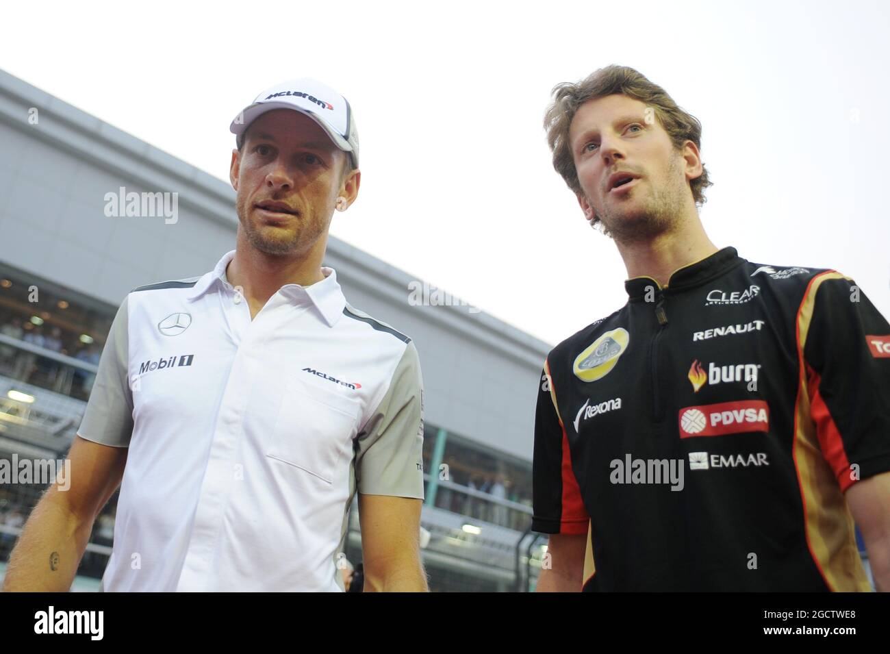 L to R): Jenson Button (GBR) McLaren with Romain Grosjean L to R): Jenson Button (GBR) McLaren with Romain Grosjean