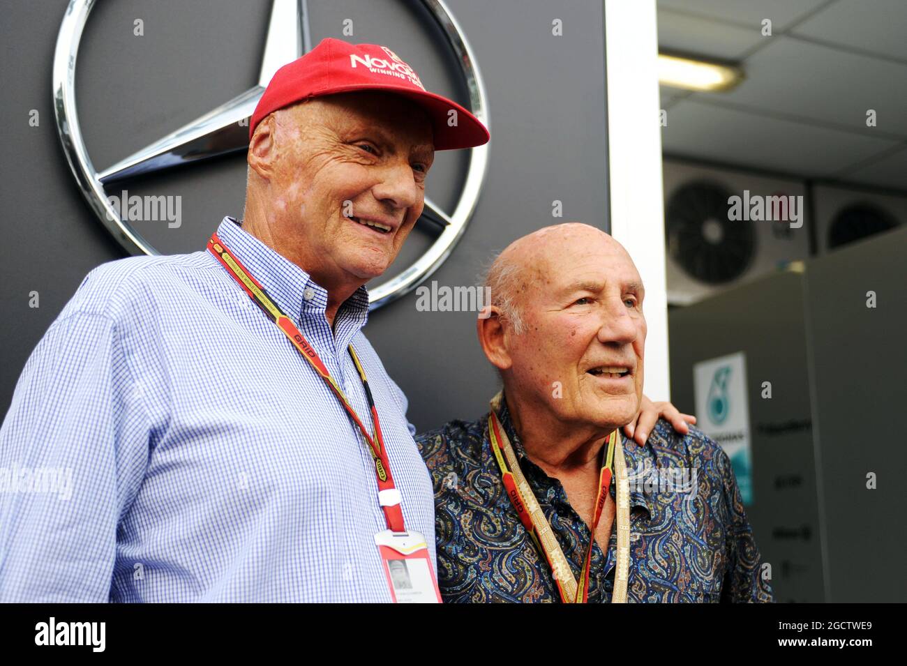 (L to R): Niki Lauda (AUT) Mercedes Non-Executive Chairman with Stirling Moss (GBR). Singapore Grand Prix, Sunday 21st September 2014. Marina Bay Street Circuit, Singapore. Stock Photo