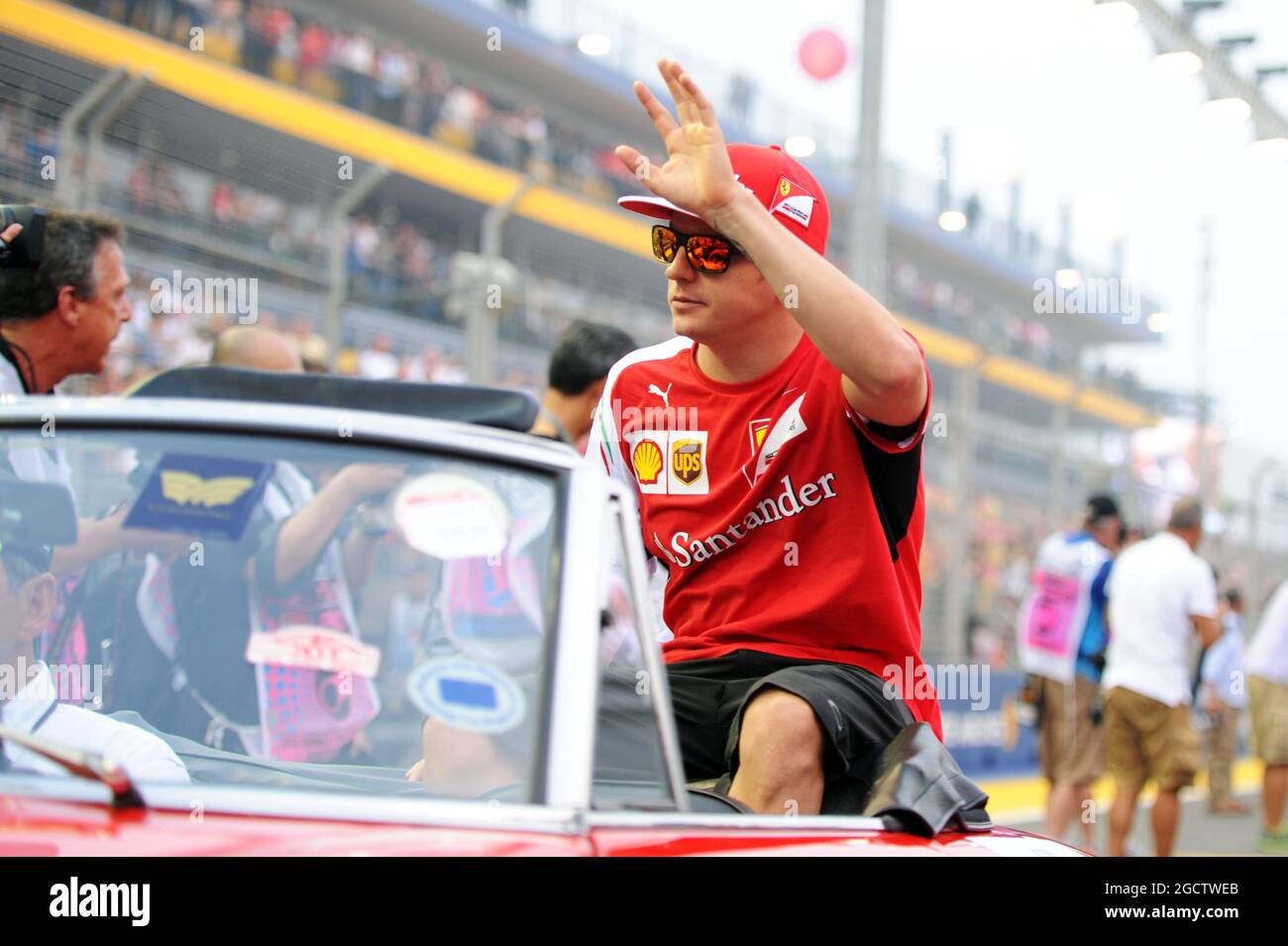 Kimi Raikkonen (FIN) Ferrari on the drivers parade. Singapore Grand Prix, Sunday 21st September 2014. Marina Bay Street Circuit, Singapore. Stock Photo