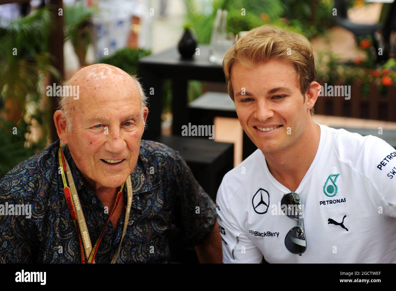 (L to R): Stirling Moss (GBR) with Nico Rosberg (GER) Mercedes AMG F1. Singapore Grand Prix, Sunday 21st September 2014. Marina Bay Street Circuit, Singapore. Stock Photo