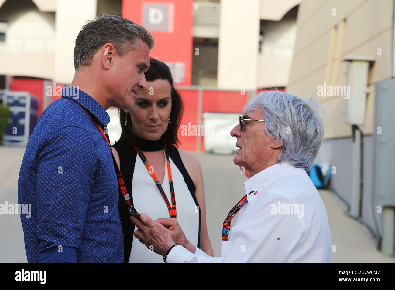 (L to R): David Coulthard (GBR) Red Bull Racing and Scuderia Toro Advisor / BBC Television Commentator with Lee McKenzie (GBR) BBC Television Reporter and Bernie Ecclestone (GBR). Bahrain Grand Prix, Saturday 18th April 2015. Sakhir, Bahrain. Stock Photo