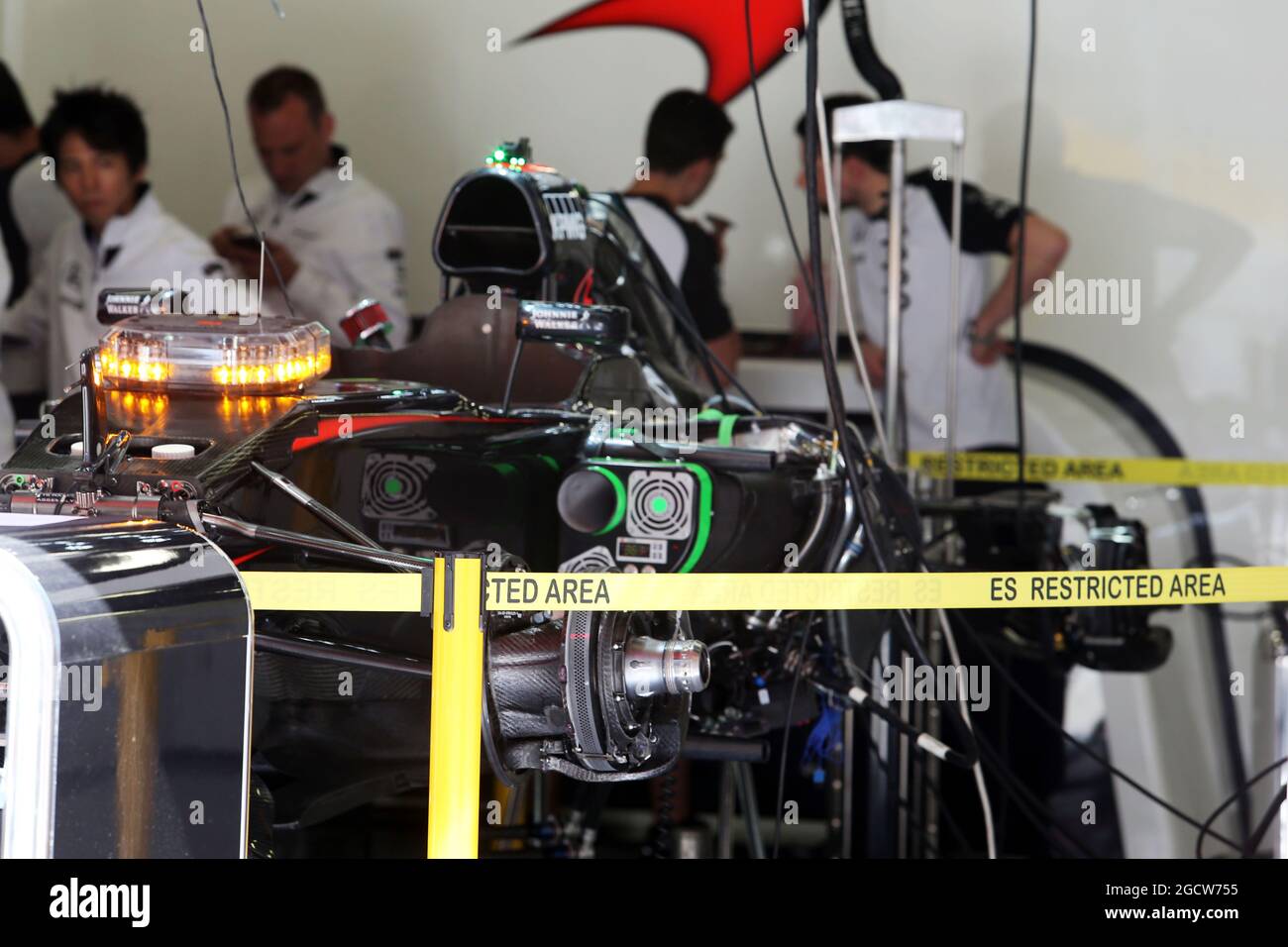 McLaren MP4-30 being prepared in the pit garage. Spanish Grand Prix, Thursday 7th May 2015. Barcelona, Spain. Stock Photo