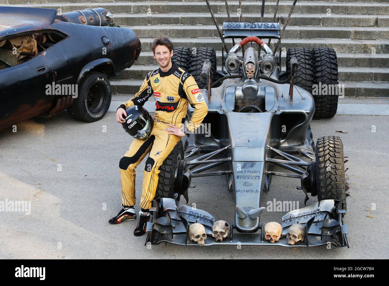 Romain Grosjean (FRA) Lotus F1 Team with special race overalls and car livery to promote the film Mad Max: Fury Road. Spanish Grand Prix, Friday 8th May 2015. Barcelona, Spain. Stock Photo