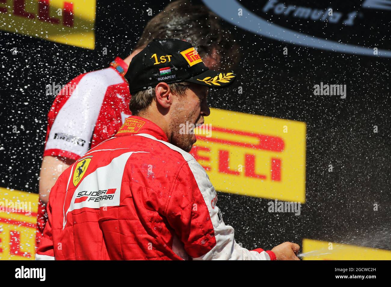 Race winner Sebastian Vettel (GER) Ferrari celebrates on the podium. Hungarian Grand Prix, Sunday 26th July 2015. Budapest, Hungary. Stock Photo