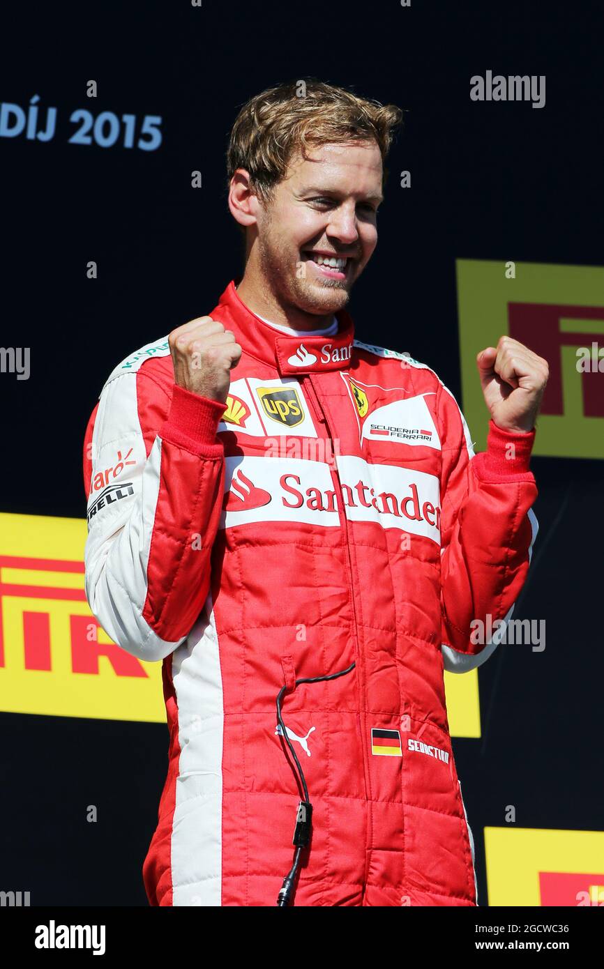 Race winner Sebastian Vettel (GER) Ferrari celebrates on the podium. Hungarian Grand Prix, Sunday 26th July 2015. Budapest, Hungary. Stock Photo