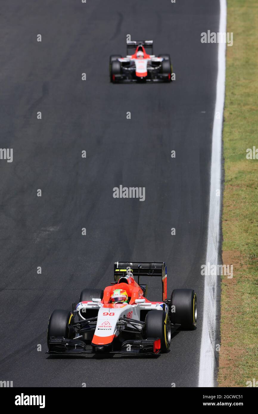 Roberto Merhi (ESP) Manor Marussia F1 Team with a loose headrest. Hungarian Grand Prix, Sunday 26th July 2015. Budapest, Hungary. Stock Photo