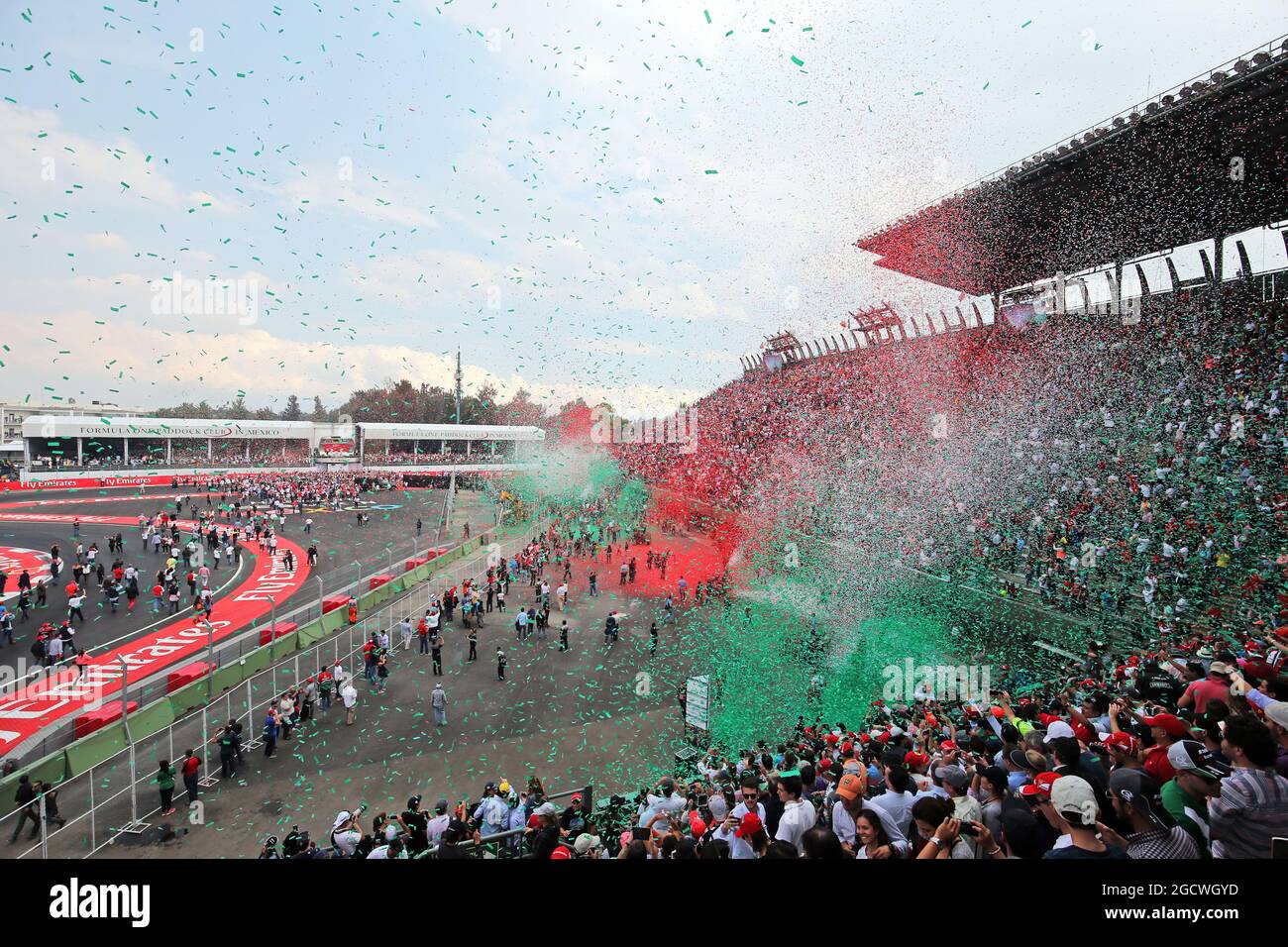 Ticker tape covers fans in the grandstand as the podium takes place. Mexican Grand Prix, Sunday 1st November 2015. Mexico City, Mexico. Stock Photo