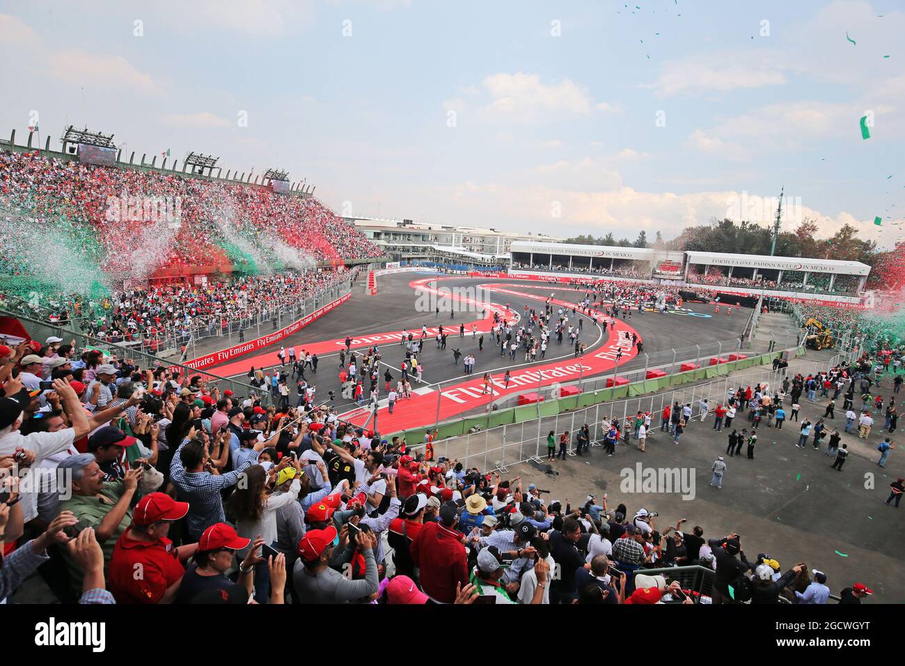 Ticker tape covers fans in the grandstand as the podium takes place. Mexican Grand Prix, Sunday 1st November 2015. Mexico City, Mexico. Stock Photo