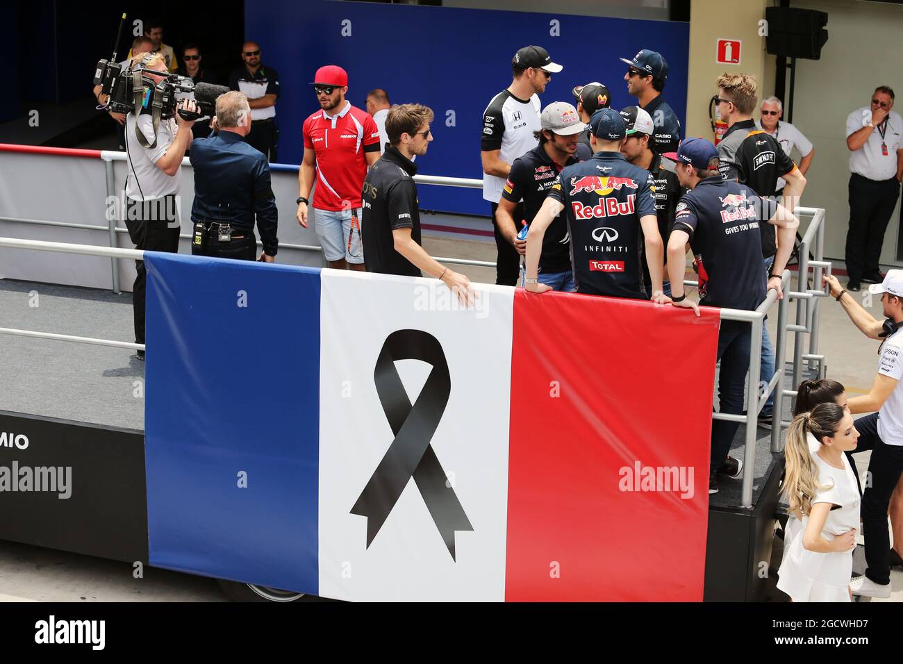 Romain Grosjean (FRA) Lotus F1 Team on the drivers parade as F1 pays its respects to the victims of the Paris terrorist attacks. Brazilian Grand Prix, Sunday 15th November 2015. Sao Paulo, Brazil. Stock Photo