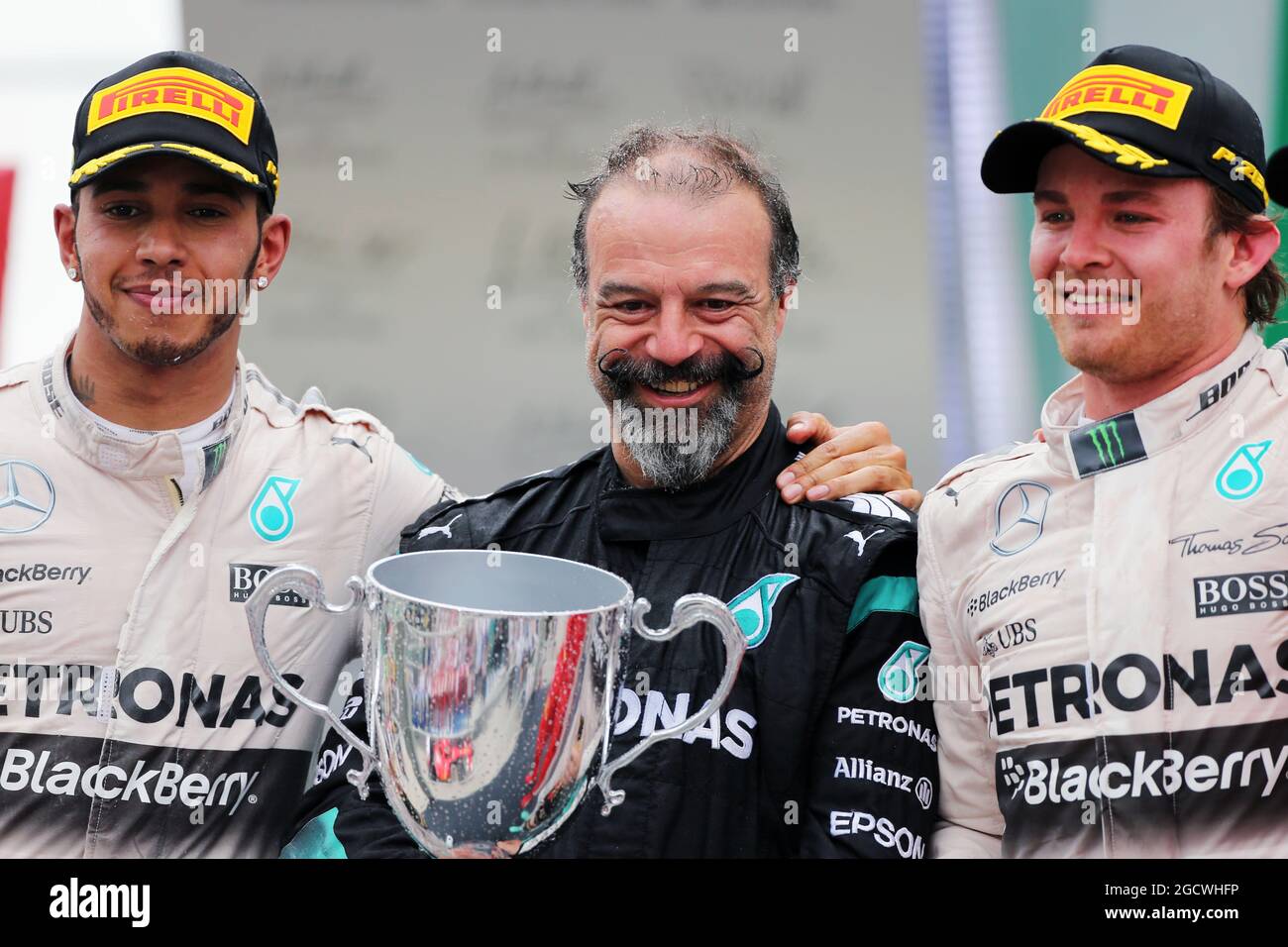 The podium (L to R): Jimmy Waddell (GBR) Mercedes AMG F1 Composite Inspector; Lewis Hamilton (GBR) Mercedes AMG F1, second; Nico Rosberg (GER) Mercedes AMG F1, race winner. Brazilian Grand Prix, Sunday 15th November 2015. Sao Paulo, Brazil. Stock Photo