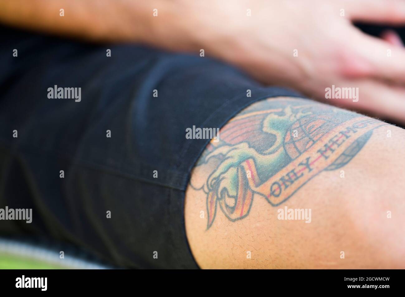 Daniel Ricciardo (AUS) Red Bull Racing - tattoo on his leg. Australian Grand Prix, Thursday 17th March 2016. Albert Park, Melbourne, Australia. Stock Photo