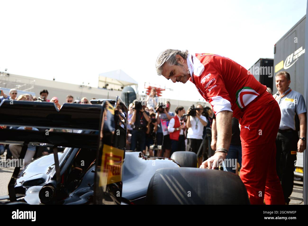Maurizio Arrivabene (ITA) Ferrari Team Principal takes a look at a Pirell mock up of what a 2017 F1 car and tyres may look like. Monaco Grand Prix, Saturday 28th May 2016. Monte Carlo, Monaco. Stock Photo