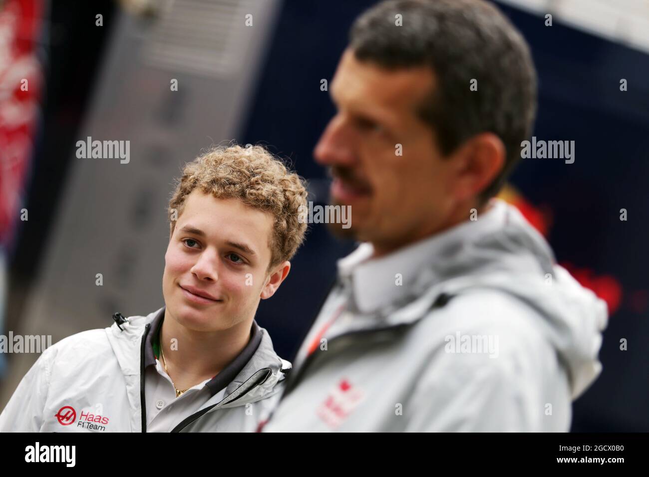 (L to R): Santino Ferrucci (USA) Haas F1 Team Development Driver with Guenther Steiner (ITA) Haas F1 Team Prinicipal. British Grand Prix, Friday 8th July 2016. Silverstone, England. Stock Photo