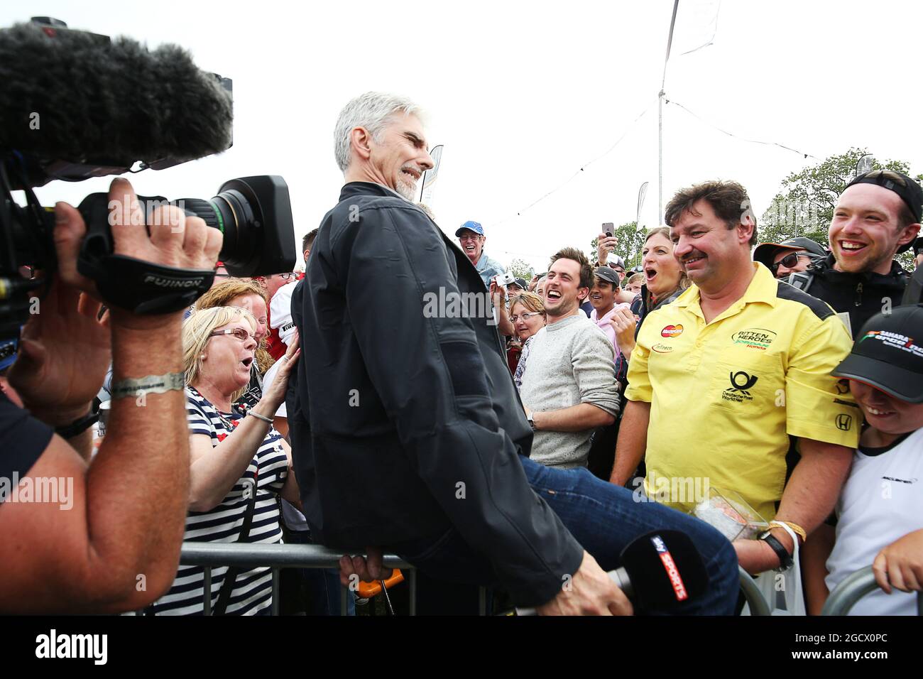 Damon Hill (GBR) Sky Sports Presenter with fans at the Sahara Force India F1 Team Fan Zone at Woodlands Campsite. British Grand Prix, Saturday 9th July 2016. Silverstone, England. Stock Photo
