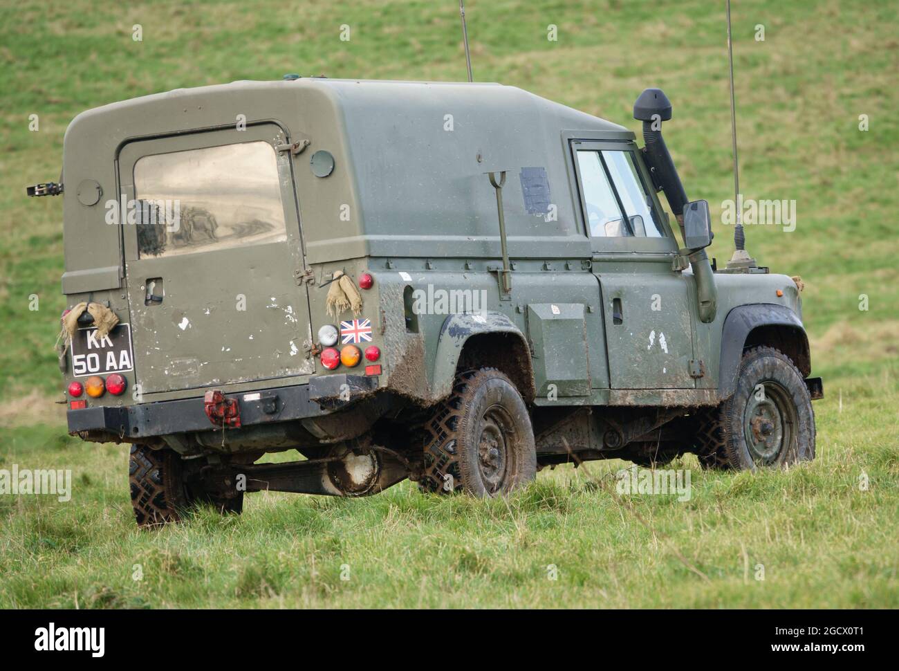 British Army Land Rover Defender light utility vehicle on exercise Salisbury Plain, Wiltshire, UK Stock Photo