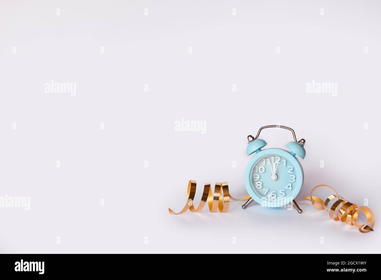 blue alarm clock on a white background.. mock up Stock Photo - Alamy