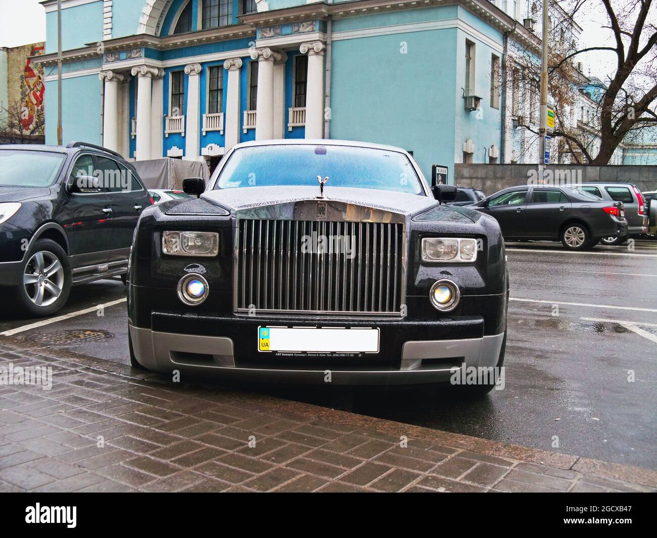 Kiev, Ukraine - April 8, 2011: Black Rolls-Royce Phantom in the raindrops Stock Photo