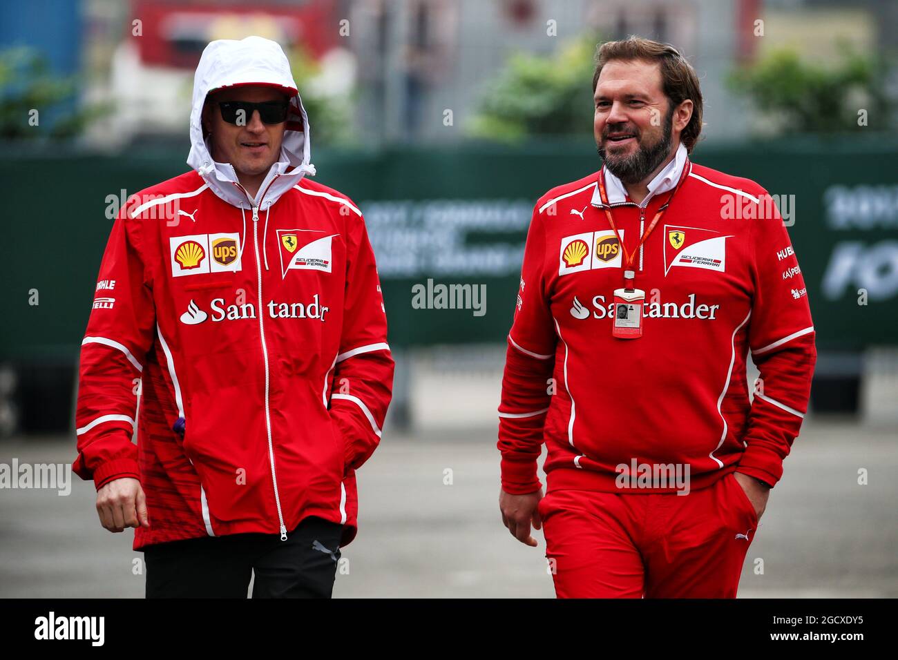 Kimi Raikkonen (FIN) Ferrari with Gino Rosato (CDN) Ferrari. Stock Photo