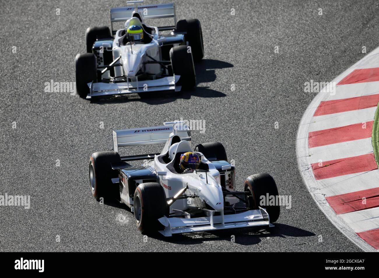 Patrick Friesacher (AUT) and Zsolt Baumgartner (HUN) in Two-Seater F1 Experiences Racing Cars. Spanish Grand Prix, Saturday 13th May 2017. Barcelona, Spain. Stock Photo