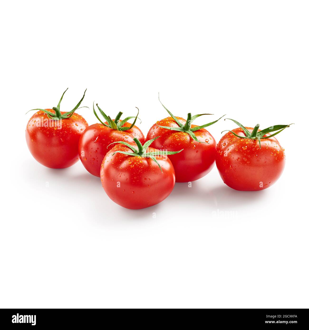 Tomatoes with drops of water isolated on white background Stock Photo ...