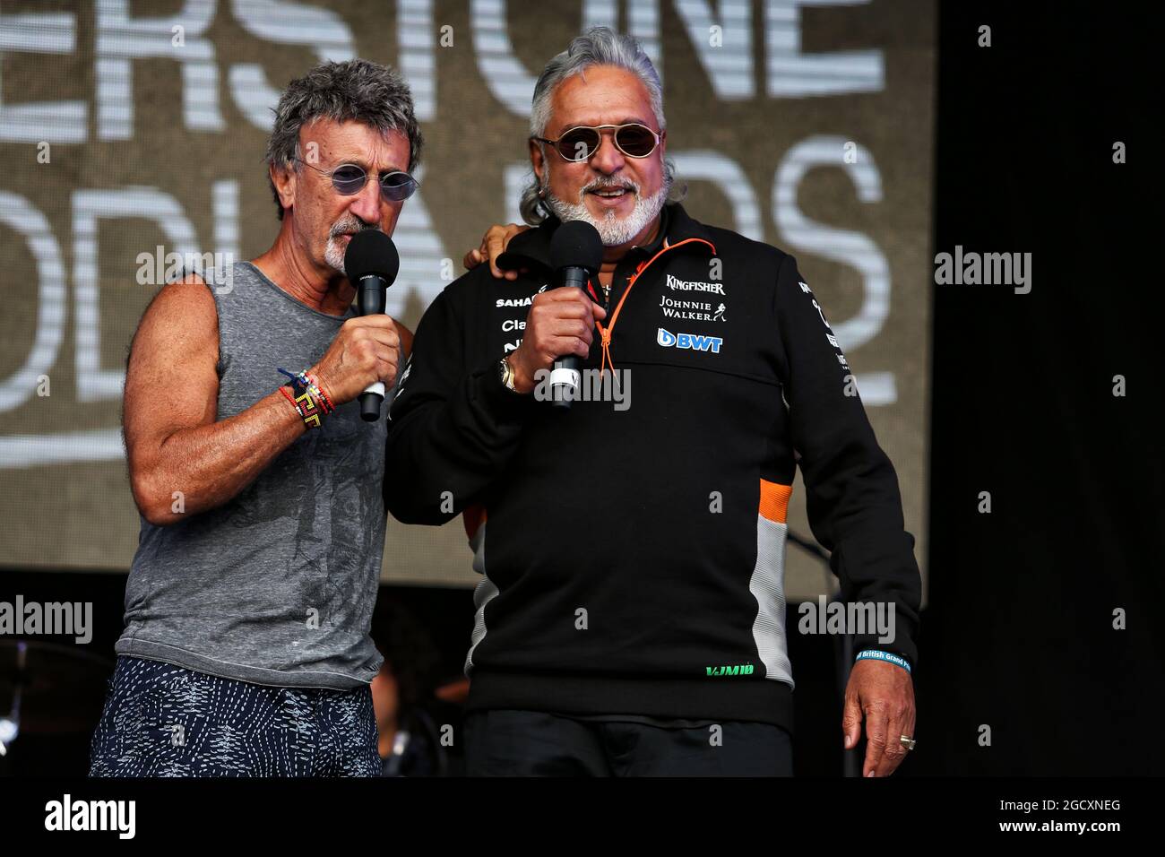 (L to R): Eddie Jordan (IRE) and Dr. Vijay Mallya (IND) Sahara Force India F1 Team Owner at the Silverstone Woodlands Campsite. British Grand Prix, Friday 14th July 2017. Silverstone, England. Stock Photo
