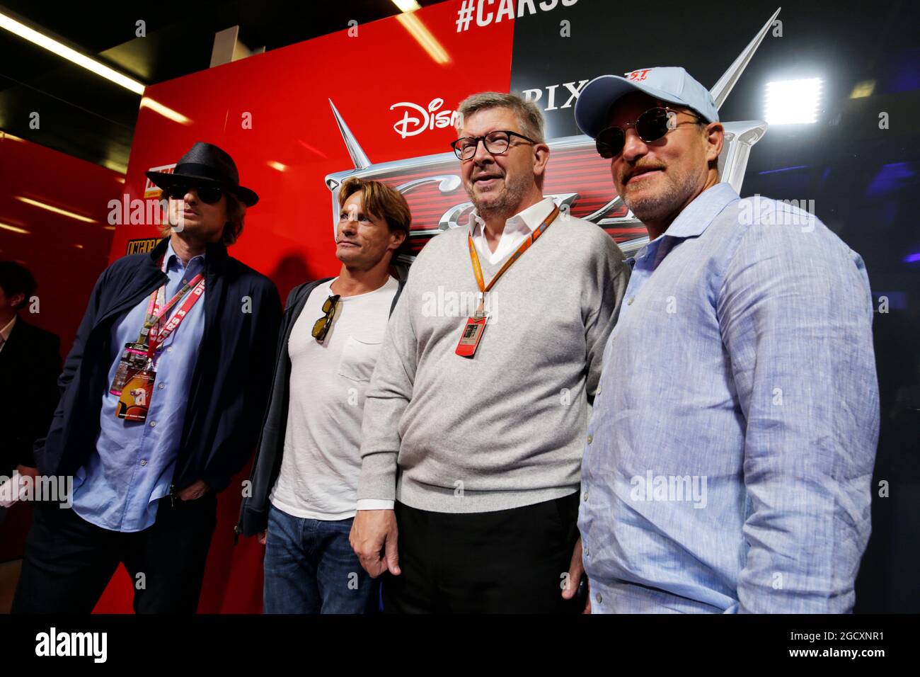 Owen Wilson (USA) Actor (Left), Ross Brawn (GBR) Managing Director, Motor Sports, (Centre), and Woody Harrelson (USA) Actor (Right). British Grand Prix, Sunday 16th July 2017. Silverstone, England. Stock Photo