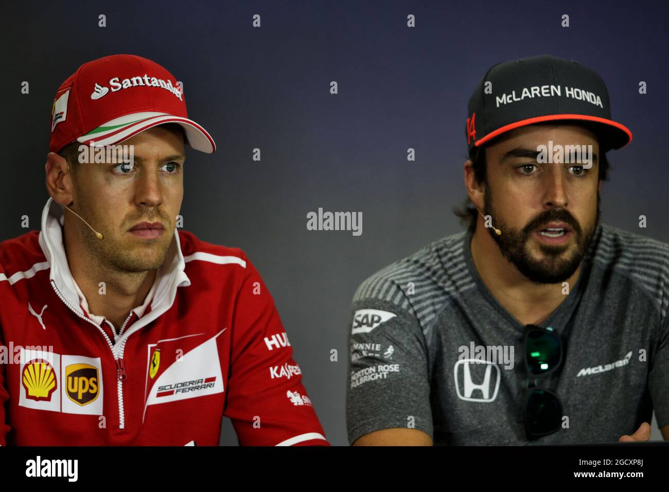 L to R): Sebastian Vettel (GER) Ferrari with Fernando Alonso (ESP) McLaren  in the FIA Press Conference. Hungarian Grand Prix, Thursday 27th July 2017.  Budapest, Hungary Stock Photo - Alamy