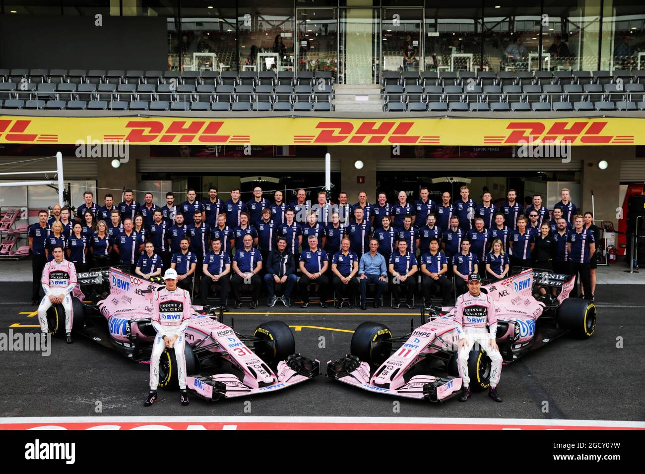 (L to R): Alfonso Celis Jr (MEX) Sahara Force India F1 Development Driver; Esteban Ocon (FRA) Sahara Force India F1 VJM10; and Sergio Perez (MEX) Sahara Force India F1; at a team photograph including Lutz Huebner, BWT? Marketing Chief and Carlos Slim Domit (MEX) Chairman of America Movil. Mexican Grand Prix, Saturday 28th October 2017. Mexico City, Mexico. Stock Photo