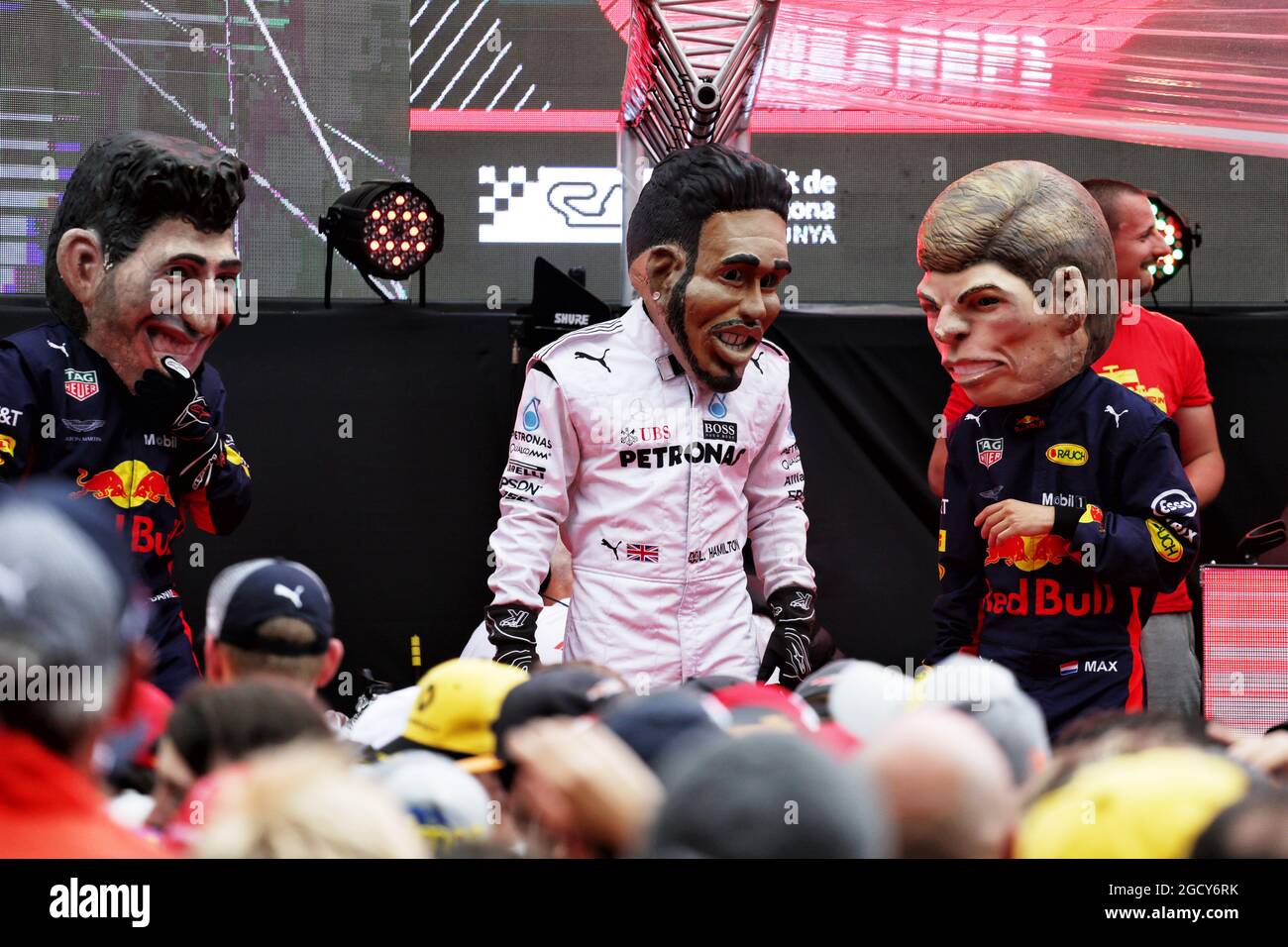 L to R): Daniel Ricciardo (AUS) Red Bull Racing; Lewis Hamilton (GBR)  Mercedes AMG F1; and Max Verstappen (NLD) Red Bull Racing caricatures in  the Fanzone. Spanish Grand Prix, Saturday 12th May