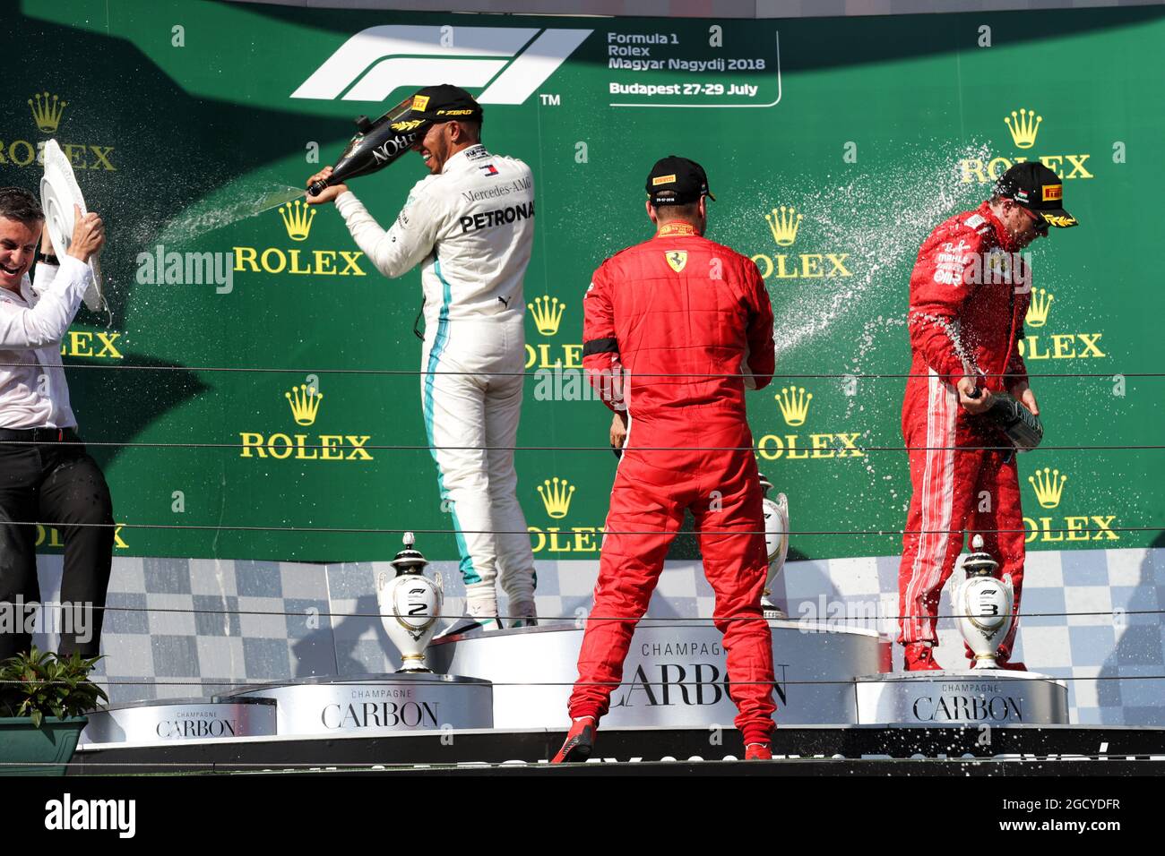Mercedes amg f1 celebrates his third position champagne on podium hi