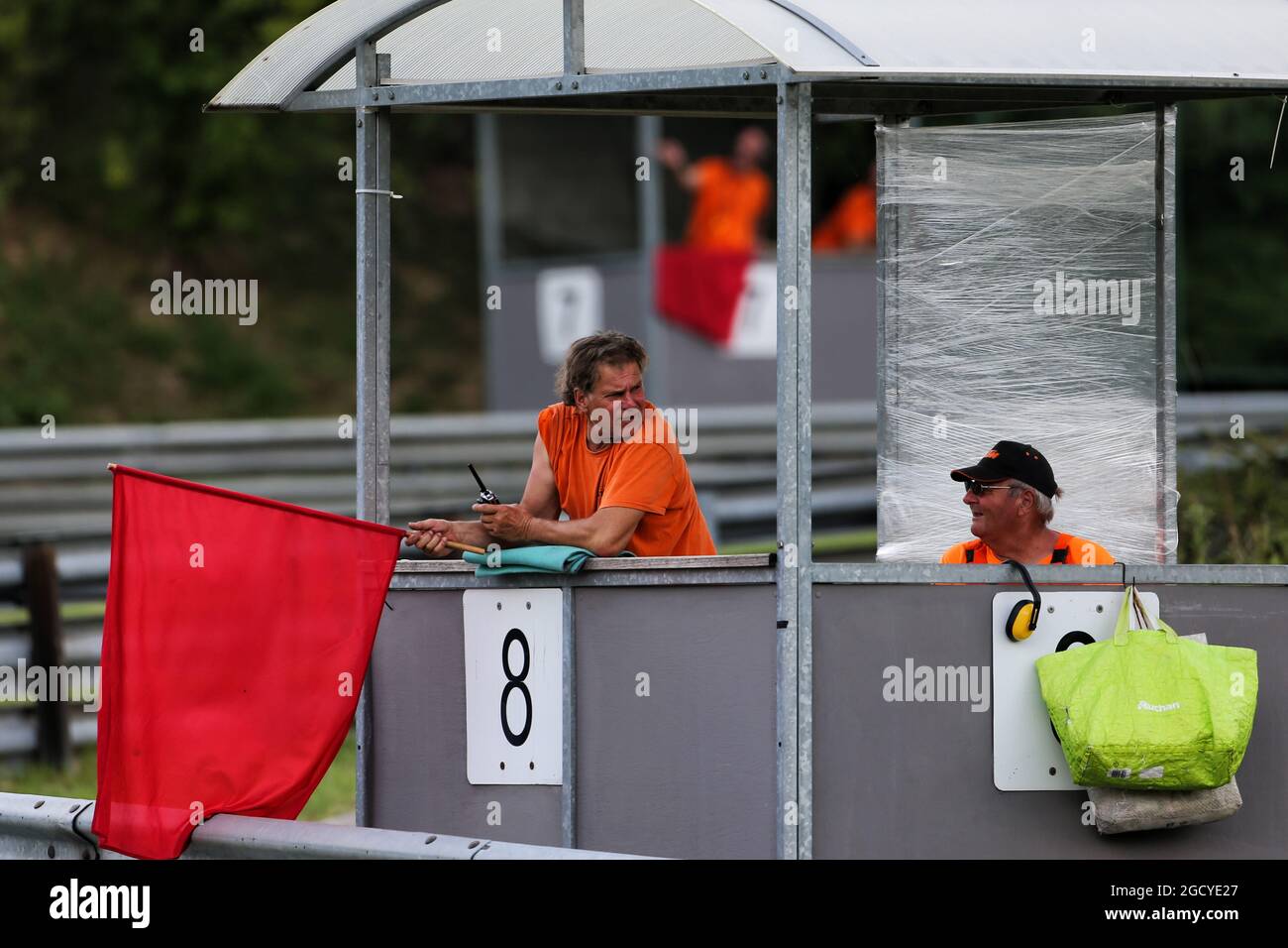 Marshal with regd flag. Formula One Testing. Tuesday 31st July 2018. Budapest, Hungary. Stock Photo