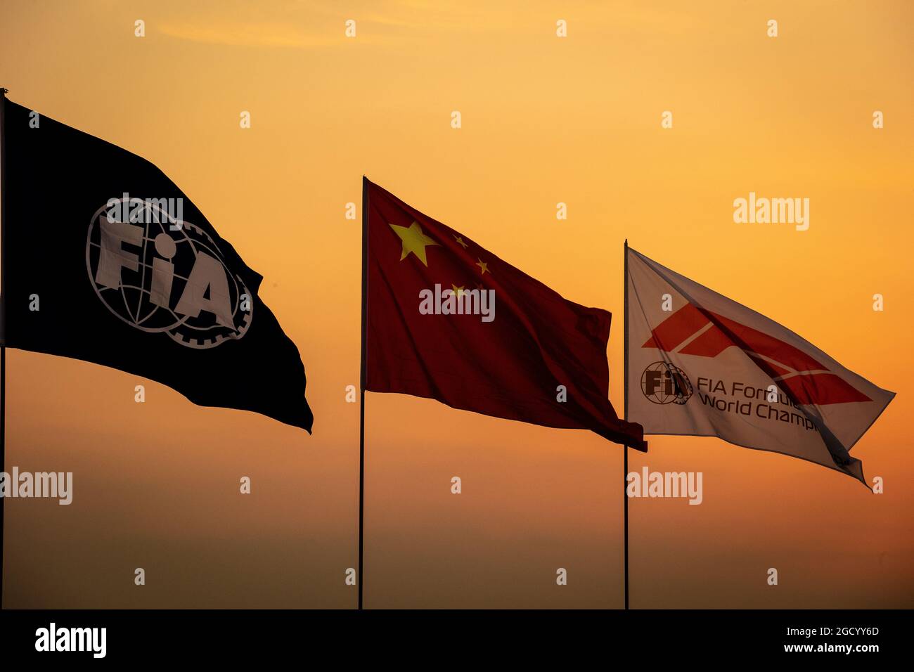 Atmosphere - flags at sunset. Chinese Grand Prix, Thursday 11th April 2019. Shanghai, China. Stock Photo