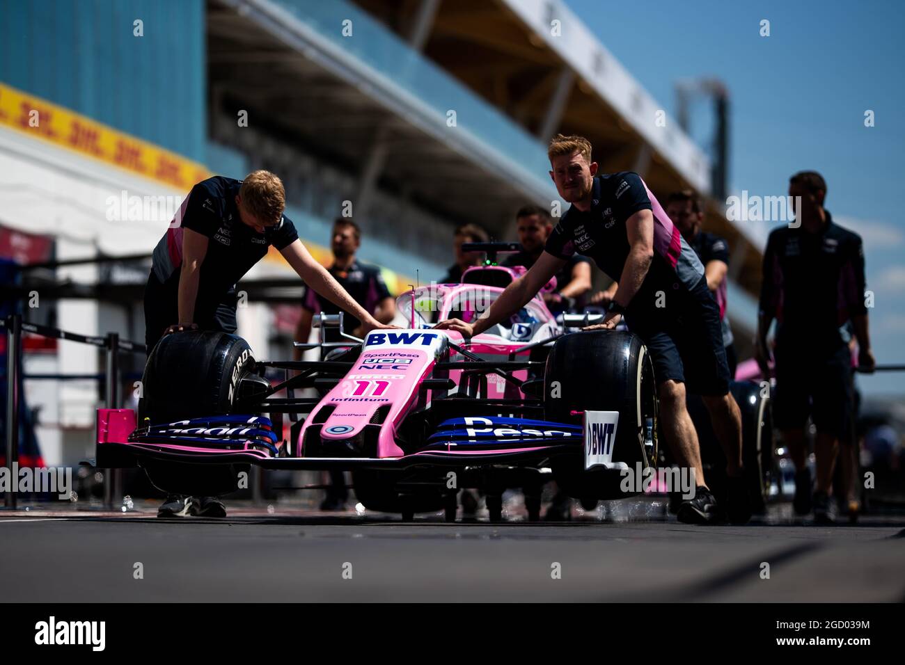 Racing Point F1 Team RP19 of Sergio Perez (MEX) is pushed down the pit lane by mechanics