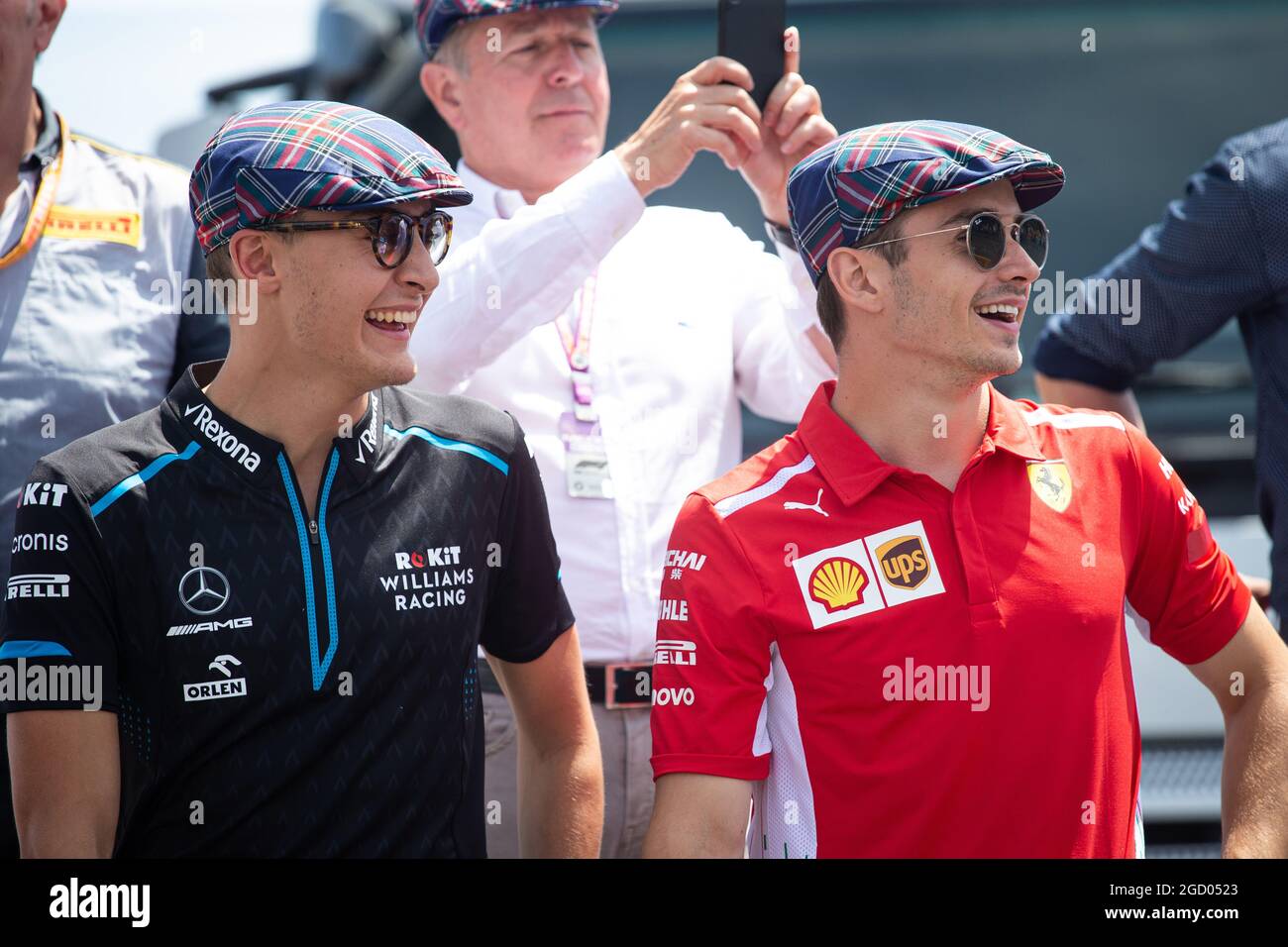 L to R): George Russell (GBR) Williams Racing and Charles Leclerc (MON)  Ferrari celebrate the 80th birthday of Jackie Stewart (GBR). French Grand  Prix, Sunday 23rd June 2019. Paul Ricard, France Stock
