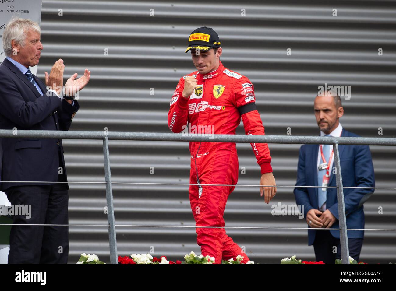 Race winner Charles Leclerc (MON) Ferrari celebrates on the podium ...