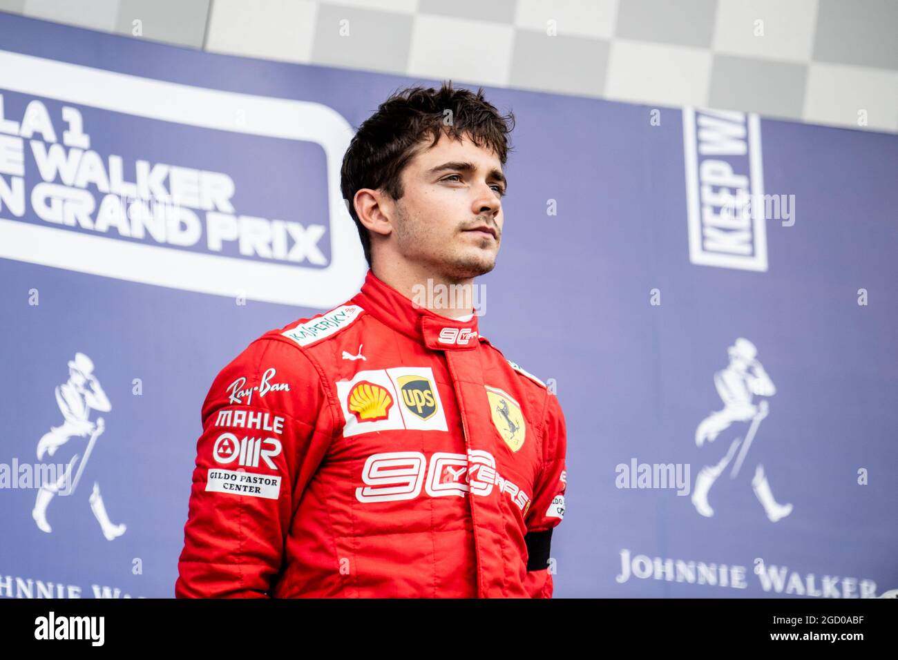Race winner Charles Leclerc (MON) Ferrari celebrates on the podium ...