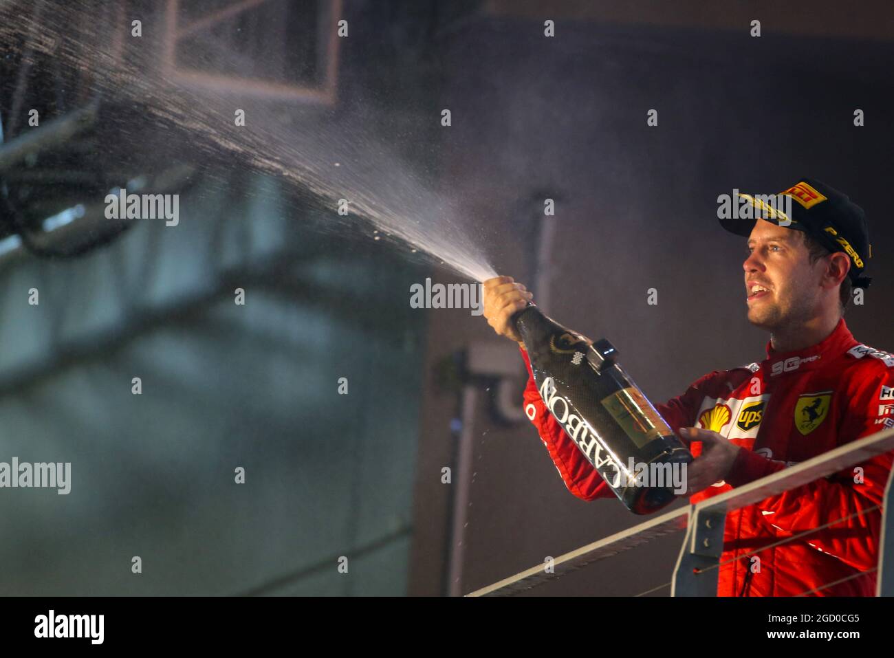 Race winner Sebastian Vettel (GER) Ferrari celebrates on the podium. Stock Photo