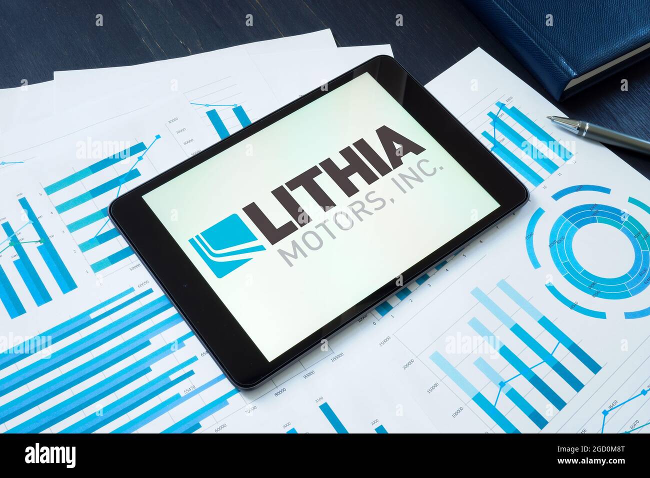 KYIV, UKRAINE - June 30, 2021. Lithia Motors Inc logo on the smartphone. Stock Photo