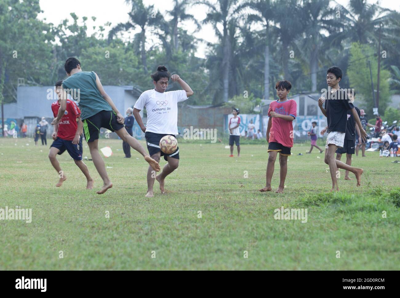 JAKARTA, INDONESIA Aug 09, 2021 Some boys playing football on the