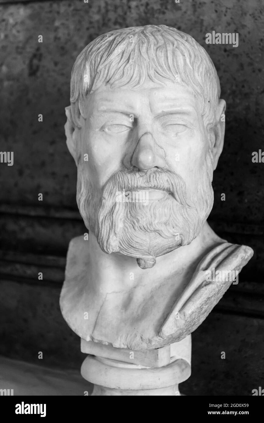 Black and white photo of ancient roman bust portraiting a mature man with a broken nose Stock Photo