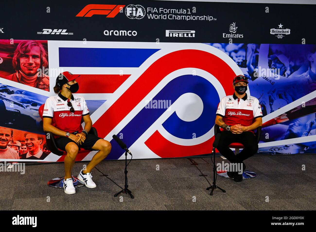 (L to R): Antonio Giovinazzi (ITA) Alfa Romeo Racing and team mate Kimi ...