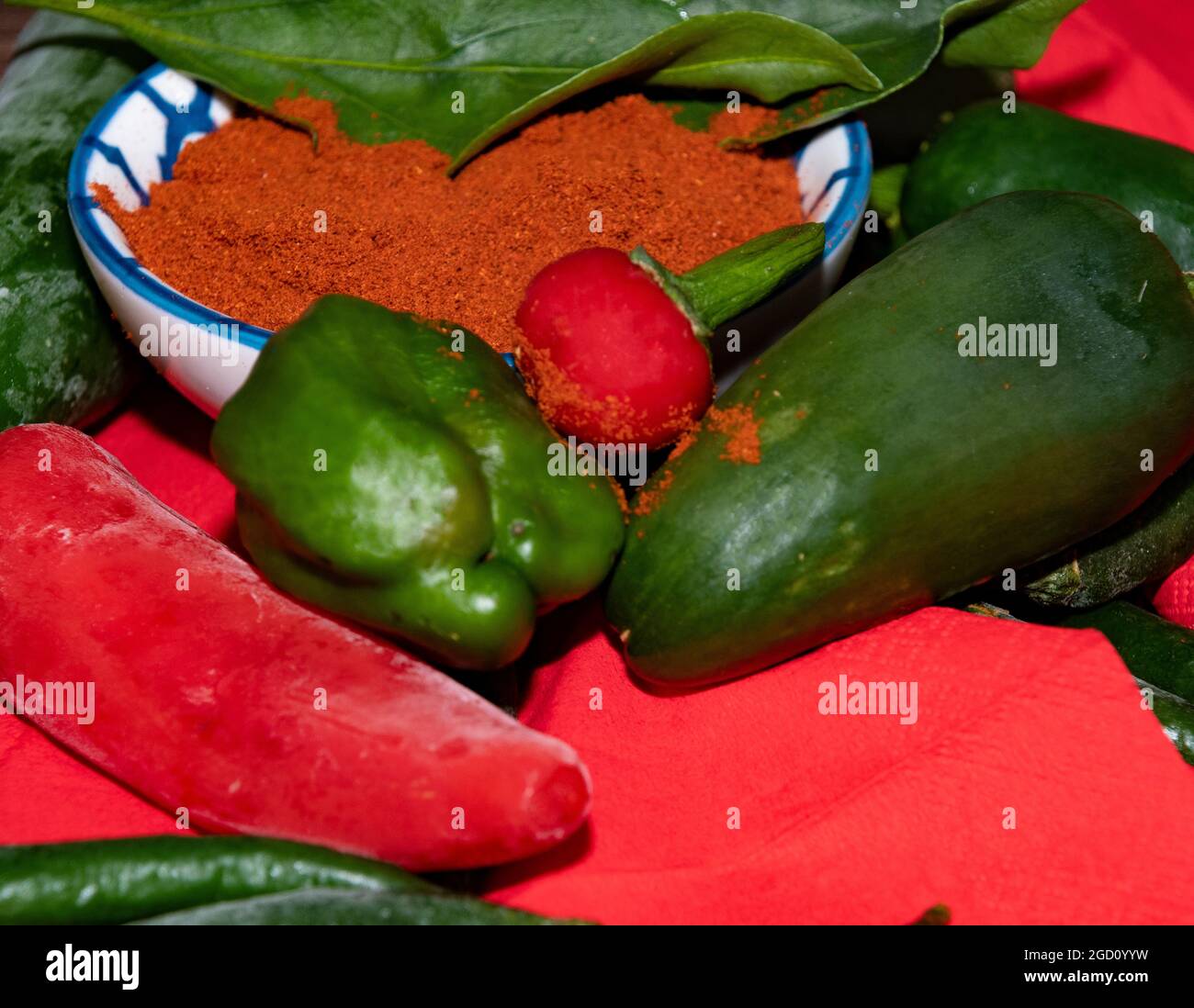 fresh grown chilli peppers and ground chilli Stock Photo Alamy