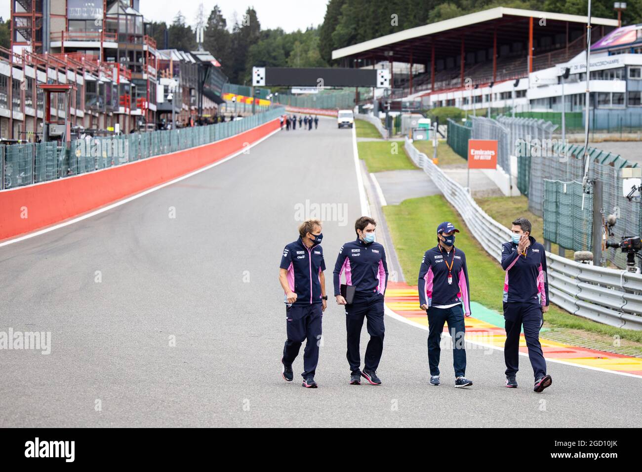 Sergio Perez (MEX) Racing Point F1 Team walks the circuit with the team ...