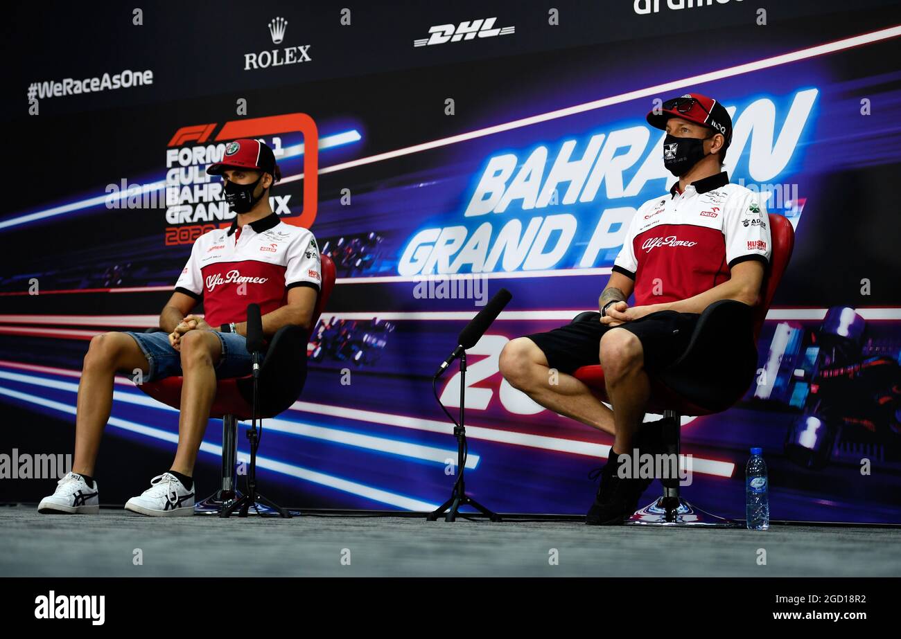 (L to R): Antonio Giovinazzi (ITA) Alfa Romeo Racing and Kimi Raikkonen ...