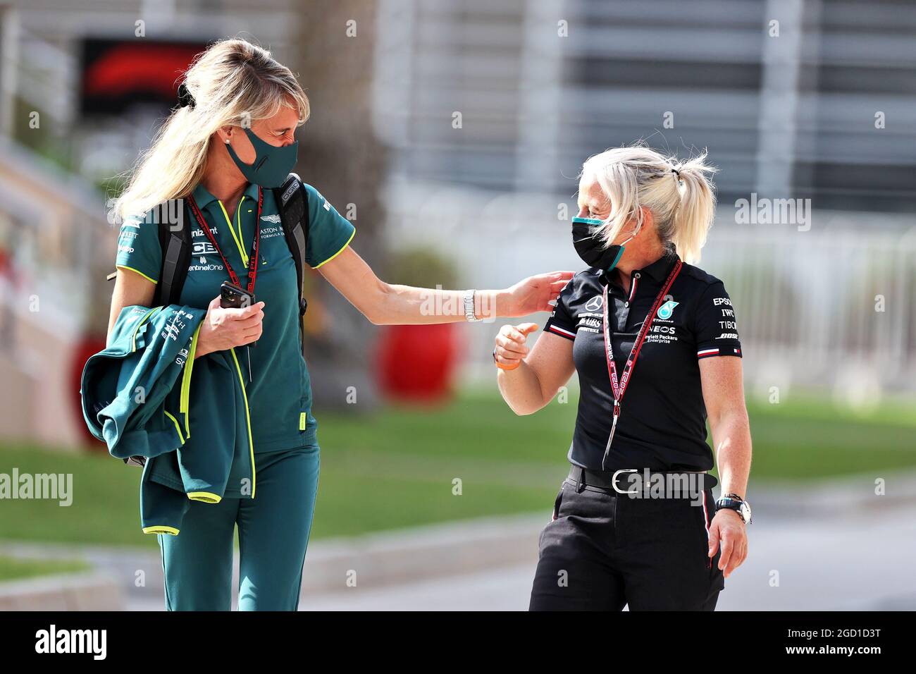 (L to R): Britta Roeske (AUT) Aston Martin F1 Team Public Relations Manager with Angela Cullen (NZL) Mercedes AMG F1 Physiotherapist. Formula One Testing, Friday 12th March 2021. Sakhir, Bahrain. Stock Photo
