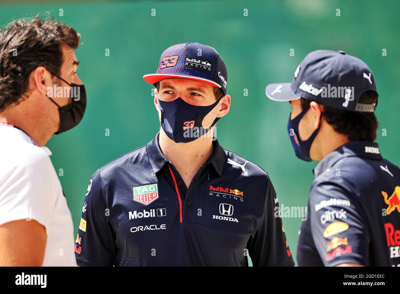 L to R): Mark Webber (AUS) Channel 4 Presenter with Max Verstappen (NLD) Red  Bull Racing and Sergio Perez (MEX) Red Bull Racing. Bahrain Grand Prix,  Saturday 27th March 2021. Sakhir, Bahrain