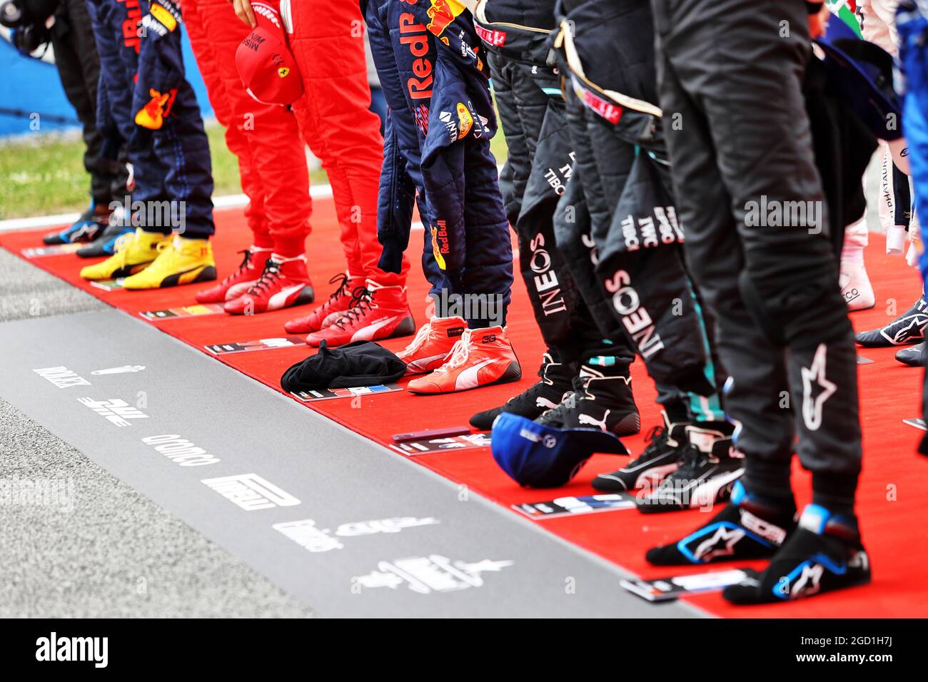 Drivers as the grid observes the national anthem. Spanish Grand Prix