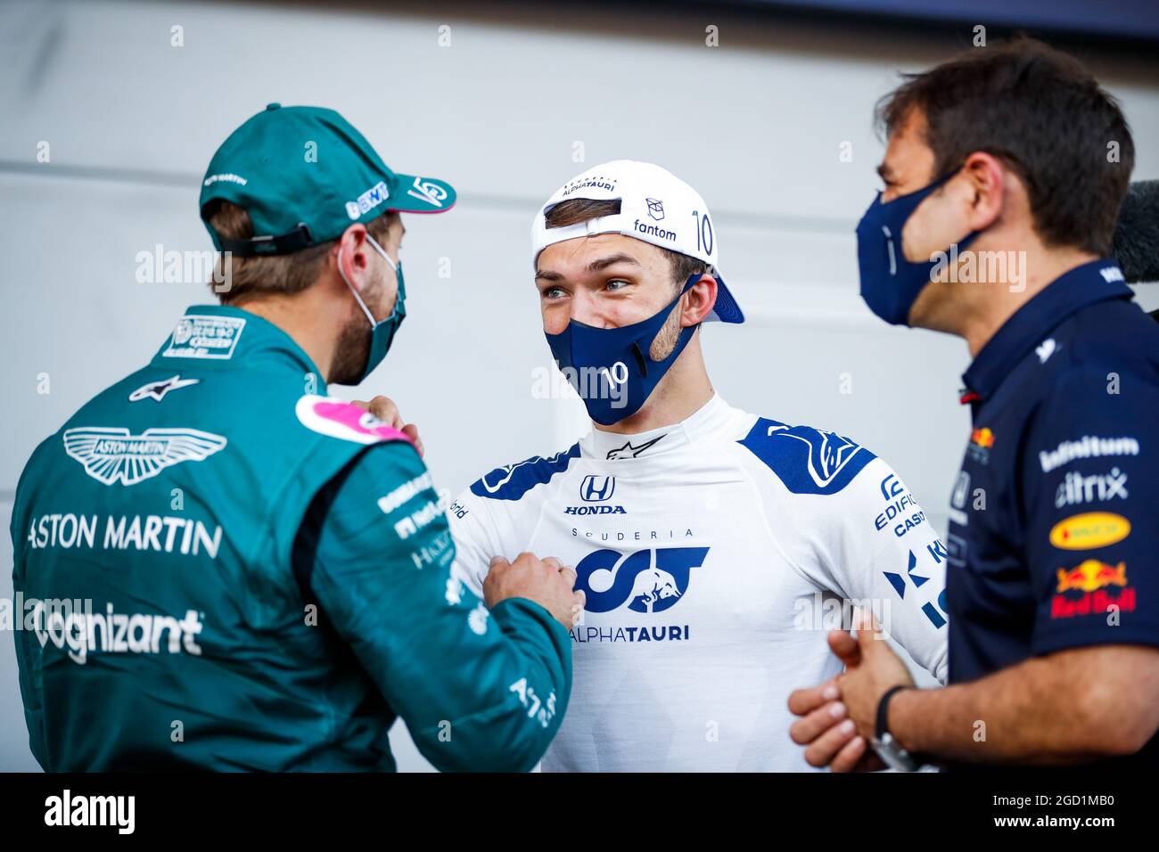 L to R): Sebastian Vettel (GER) Aston Martin F1 Team with Pierre Gasly  (FRA) AlphaTauri and Pierre Wache (FRA) Red Bull Racing Technical Director  in parc ferme. Azerbaijan Grand Prix, Sunday 6th