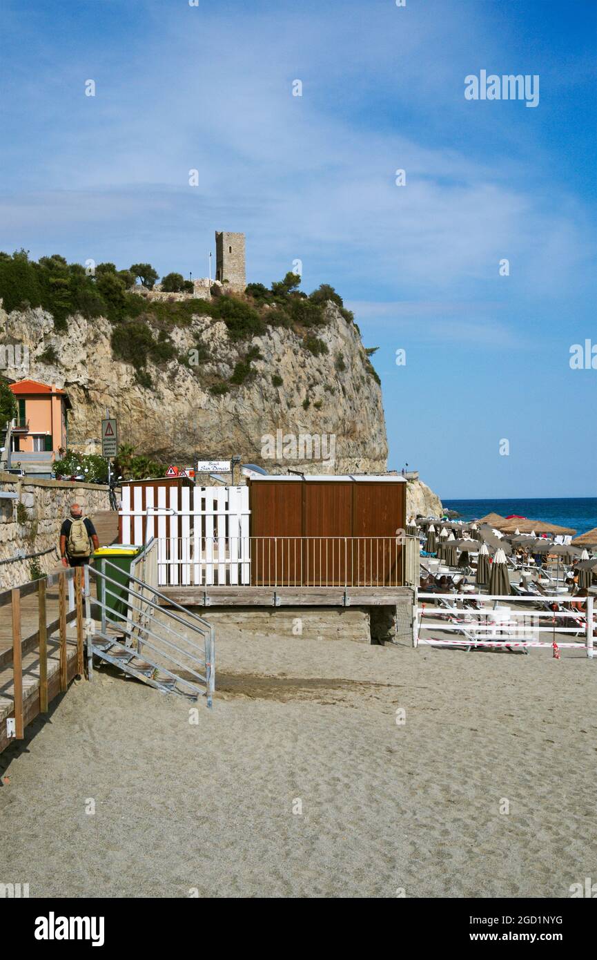 beach and torre Capo san Donato, Finale Ligure, Liguria, Italy Stock Photo
